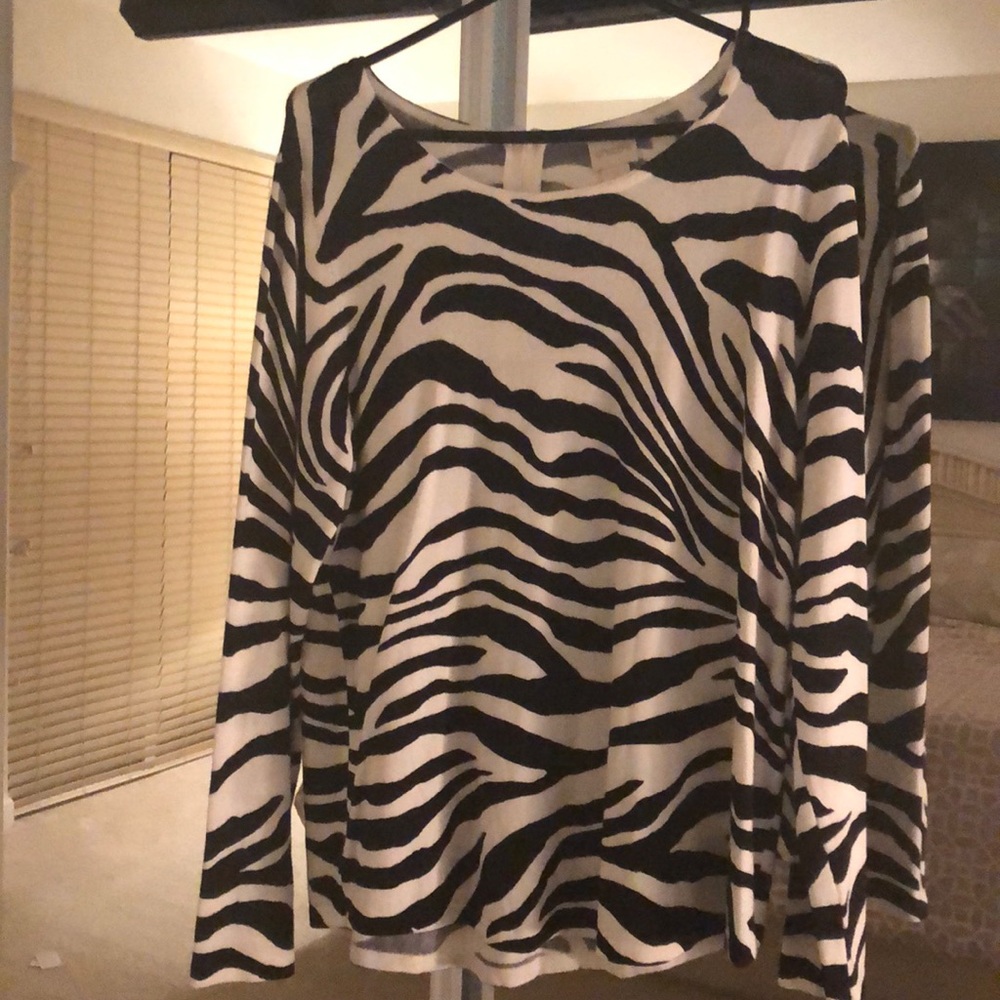 To Chico’s blouses size 2 women. Size 14 women